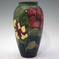 Lot 232 - Tall Moorcroft hibiscus vase.