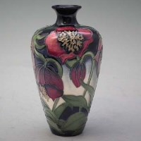 Lot 237 - Moorcroft festival flowers vase.