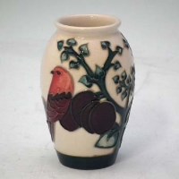 Lot 238 - Moorcroft plum vase small.