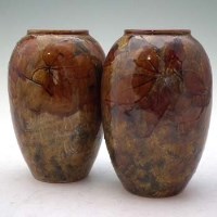 Lot 242 - Pair of Royal Doulton leaf vases