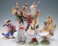 Lot 247 - Set of twelve Doulton dancers of the world.