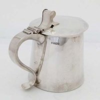 Lot 259 - Silver tankard with hinged lid.