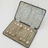 Lot 265 - Cased set of twelve apostle coffee spoons and