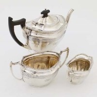 Lot 296 - Silver three-piece tea set.