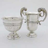 Lot 297 - Two-handled silver trophy cup and a silver trophy bowl (inscribed) (2).