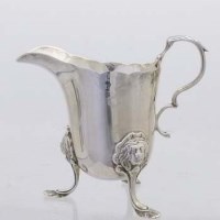 Lot 311 - Irish silver milk jug by West & Son