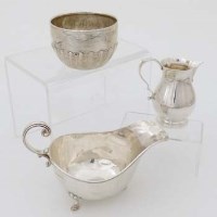 Lot 327 - Silver cream jug, bowl and a sauceboat.