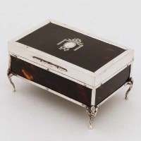 Lot 333 - Silver framed dressing table box with tortoiseshell inset panels