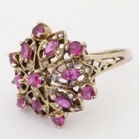 Lot 358 - 14ct gold ruby hexagonal cluster ring