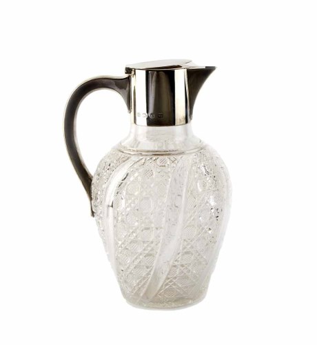 Lot 162 - A silver mounted cut glass claret jug by Hukin & Heath