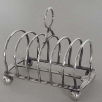 Lot 9 - White Star Line plated toast rack.