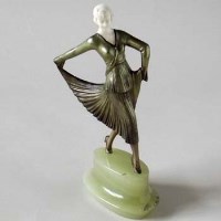 Lot 20 - 1920's bronze and ivory figure.