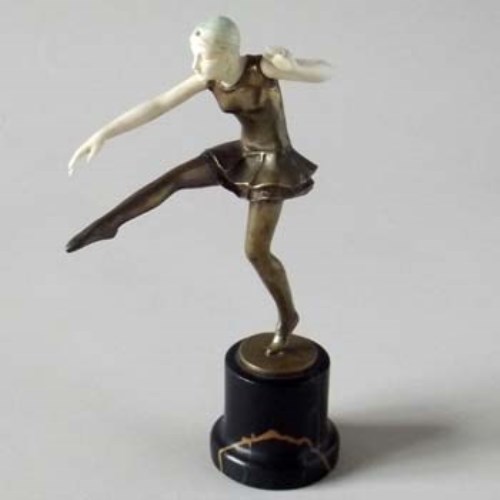 Lot 21 - Bronze and ivory figure of a dancing girl.