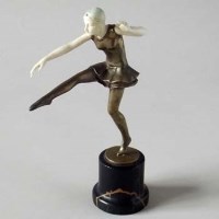 Lot 21 - Bronze and ivory figure of a dancing girl.