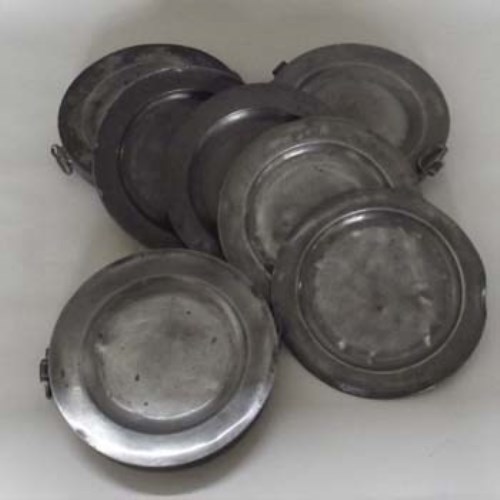 Lot 23 - Assortment of various pewter warming dishes and plates.