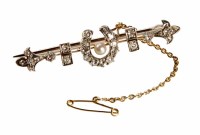 Lot 206 - Victorian diamond and seed pearl horseshoe bar brooch circa 1900