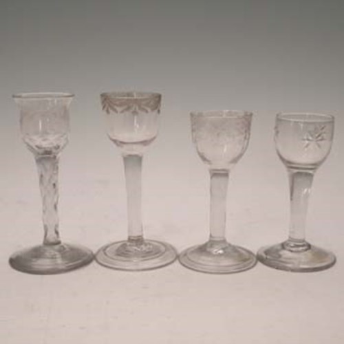 Lot 93 - Four wine glasses with engraved bowls.