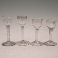 Lot 93 - Four wine glasses with engraved bowls.