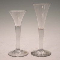 Lot 96 - Two wine glasses with flared bowls.