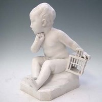 Lot 154 - French Bisque figure of a baby.