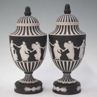Lot 168 - Pair of Wedgwood black jasper dip lidded vases