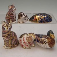 Lot 173 - Six Royal Crown Derby paperweights.
