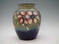 Lot 180 - Large Moorcroft Clematis pattern vase.