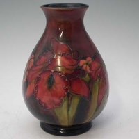 Lot 181 - Moorcroft orchid pattern vase.