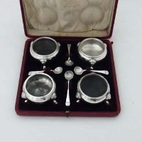 Lot 215 - Cased set of four silver salts and four spoons