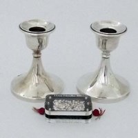 Lot 224 - Pair of squat Silver candlesticks and 1oz of