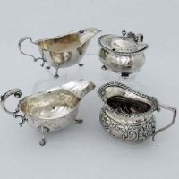 Lot 236 - Two silver sauce boats, milk jug, chester mustard