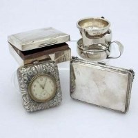 Lot 239 - Silver tea strainer, purse, cigarette box, watch.