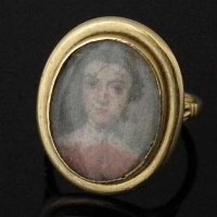 Lot 247 - Gold miniature portrait ring