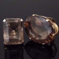 Lot 272 - Large oval brownish topaz, 41.5 x 31.6mm, in an