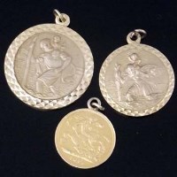 Lot 276 - Soldered Victoria half-sovereign and two 9ct medallions.