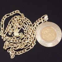 Lot 286 - 1911 half-sovereign in 9ct mount on 9ct chain.