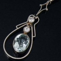 Lot 289 - 15ct gold aquamarine and diamond oval pendant
