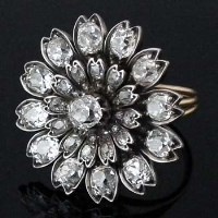 Lot 298 - Old mine cut diamond large floret set as a ring