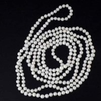 Lot 308 - Cultured white pearl long necklace, the slightly