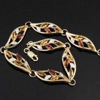 Lot 346 - 9ct gold bracelet of leaf shaped links each set