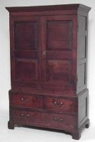 Lot 565 - George III oak wardrobe