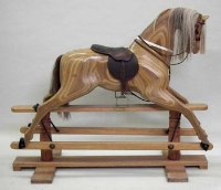 Lot 577 - Relko laminated rocking horse 1982