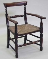 Lot 578 - Fruitwood elbow chair, early 19th century