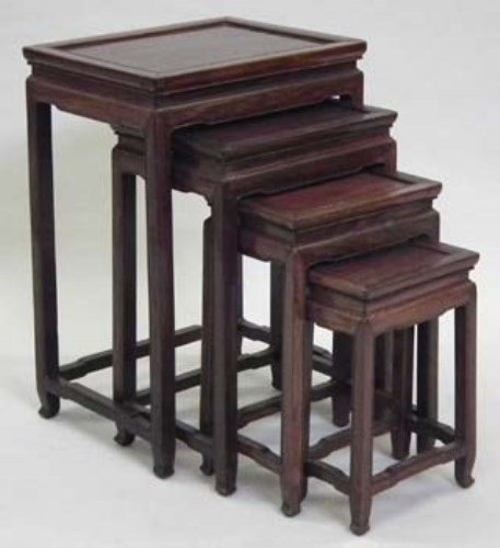 Lot 582 - Set of four Chinese rosewood nesting tables