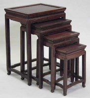 Lot 582 - Set of four Chinese rosewood nesting tables