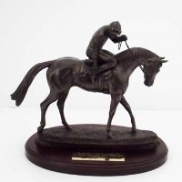 Lot 47 - Bronze resin flat racing trophy of a horse and