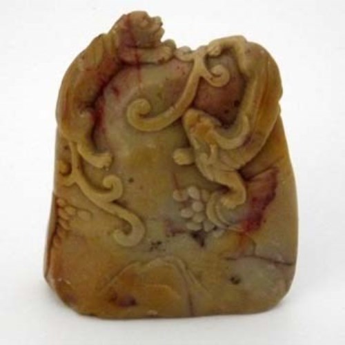 Lot 120 - Brownish grey jade carved boulder of a mountain with a lion and