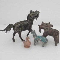 Lot 121 - Four pottery and bronze models of animals