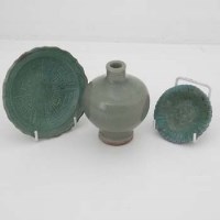 Lot 126 - Longquan celadon vase and two small dishes