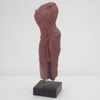 Lot 136 - Indian red stone statuette fragment